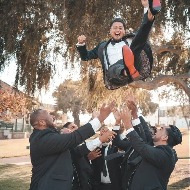 Tis the season for falling leaves and falling...grooms? Meanwhile, we're falling for the friends in suits as crisp as the autumn air.