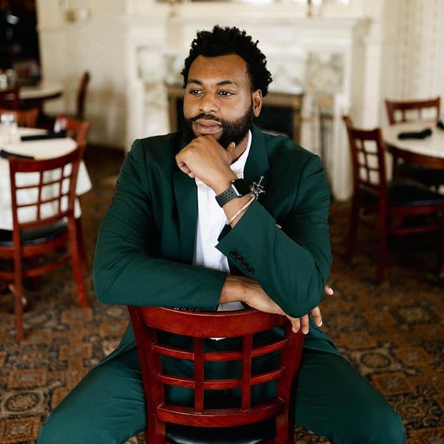 Dreaming, scheming, creating. No need for a thinking cap when you've got a smart (looking) suit.