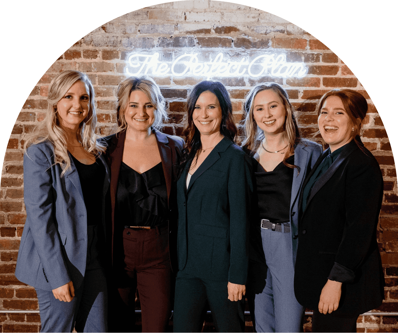 Wedding planning company in company uniform of stylish women's suits.